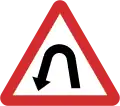 B11: Hairpin bend to the left ahead