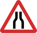 B14: Road narrows on both sides