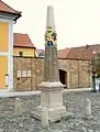 Distance milepost on the market square at Neustadt in Sachsen