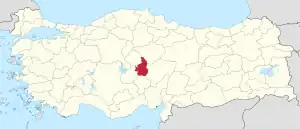 Nevsehir highlighted in red on a beige political map of Turkeym