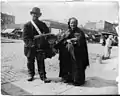 New York City, 1897.  The organ grinder and his wife