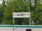 Former platform sign at Newry station. The current sign also has the Irish name.