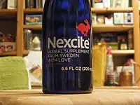 A closeup of a bottle of Nexcite