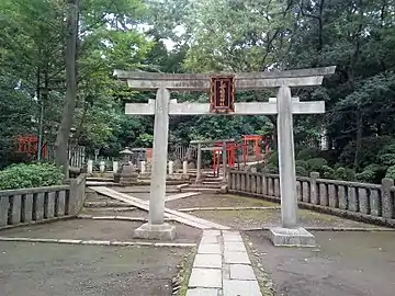 a stone myōjin torii
