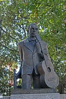 Statue of Niño Ricardo. Cristo de Burgos Square. Seville.