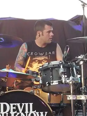 Augusto performing with Devil You Know in 2016