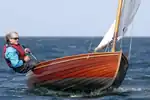 In 12' Dinghy: Nicky Arnoldus (CAN), former Dutch Champion, during a race of the 2018 Vintage Yachting Games.