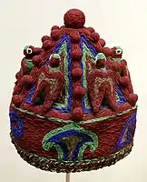 An example of a beaded royal coronet, (Akoro), Indianapolis Museum of Art. The Akoro was usuallly smaller than an Adé, fringeless and was usually worn by lesser ranking kings, nobles and community leaders under powerful regional Obas.