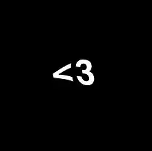 Picture of a < symbol and a 3 forming a heart. The < symbol and 3 are white on a black background. The image is slightly warped.