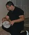 Man playing a tombak