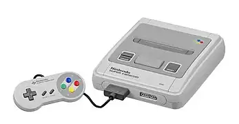 A Super Nintendo Entertainment System (a white video game console with two purple buttons for "Power" and "Reset" and a grey one for "Eject") and its controller (a gampad with a D-pad on the left, "Start" and "Select" buttons in the middle, four buttons on the right, and two shoulder buttons on top).