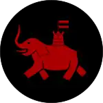 Small fort atop a charging elephant, red within a black circle