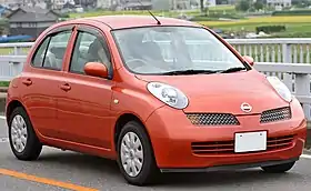 Small orange five-door car