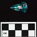 A glass bead found at Nixtun Chʼichʼ