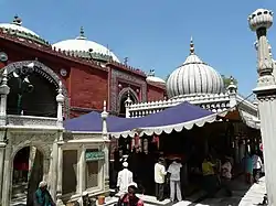 Dargahs of Sufi-saint Nizamuddin Auliya, and poet and musician Amir Khusro in Delhi.