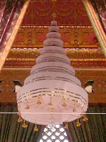 Nobapadol Mahasvetachatra (nine-tiered-white-umbrella) over the funeral pyre of King Bhumibol Adulyadej.