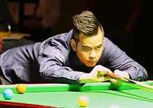 Noppon Saengkham playing a shot