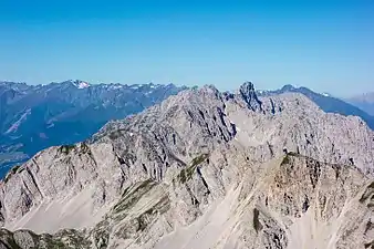 View of the Nordkette from the Stempeljochspitze. The Kleiner Solstein can be seen rising prominently