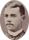 Oval photograph of young man, 1885.