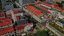 Bugis Junction's glass roof provided for pre-war shophouses. February 2019.