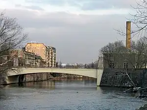 Market Street Bridge, looking downstream, with Brandywine Village on the left, and the Wilmington Pumping Station on the right.  The bridge marks the approximate high level of tidewater on the Brandywine.