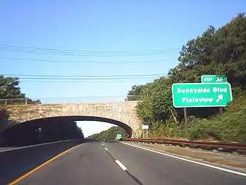 Exit 38 on the Northern State Parkway in Plainview, west of where the Bethpage and Caumsett state parkways were to meet.