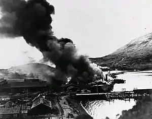 SS Northwestern in flames at Dutch Harbor, Unalaska, Alaska