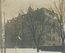 Exterior view of the Notre Dame Academy building in 1907 from a postcard