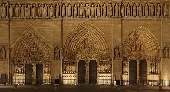 The three tympana on the main façade of Notre-Dame de Paris, France.