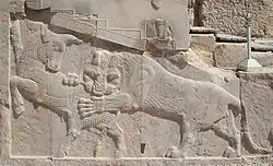 Persian low or bas-relief in Persepolis – a symbol of Zoroastrian Nowruz – at the spring equinox the power of the bull (personifying Earth) and lion (personifying the Sun) are equal.
