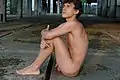 Nude on stone paving