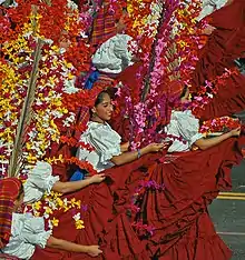 Tournament of Roses Parade in Pasadena, Los Angeles, (Nuestros Angeles de El Salvador) dancers from San Salvador, El Salvador, The dancers followed the marching band