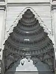 Semi-vault above one of the mosque entrances, with Baroque friezes replacing muqarnas