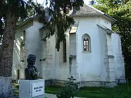 Bust of János Bolyai next to the Reformed church from Nușeni