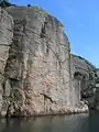 Olavsund strait, where a face can be seen in the rock wall