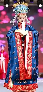 Diyi worn with phoenix crown