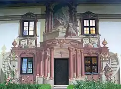Lüftlmalerei adorning the facade of the Pilatushaus