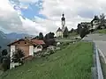 Obertelfes, road panorama with church