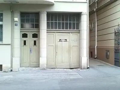 Adorned entrance doors