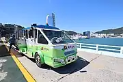 An optional paid train-like bus used to move passengers along the 768 meter bridge (2018)