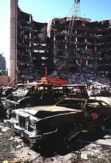 Image 99The federal building that was bombed in the Oklahoma City bombing two days after the bombing, viewed from across the adjacent parking lot. (from 1990s)