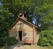 The replica of the Old Mission log church