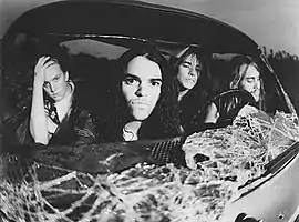 Kyuss c. 1992. Left to right: Josh Homme, Brant Bjork, John Garcia, Nick Oliveri.