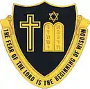 Old US Army Chaplain School seal, with Christian and Jewish religious symbols—with Hebrew letters in the Jewish symbol, 1983