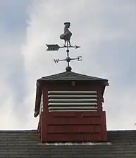 Weathervane.  The cock's tail is in the barn.