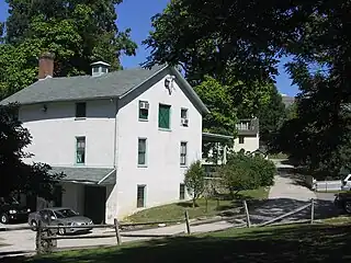 The Wister's carriage house and Peale House.