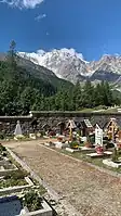 Old Church cemetery with the east wall of Monte Rosa in the background, Macugnaga, Italy