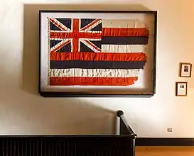 The last Flag of Hawaii to fly over the courthouse was on permanent display prior to its destruction in 2023