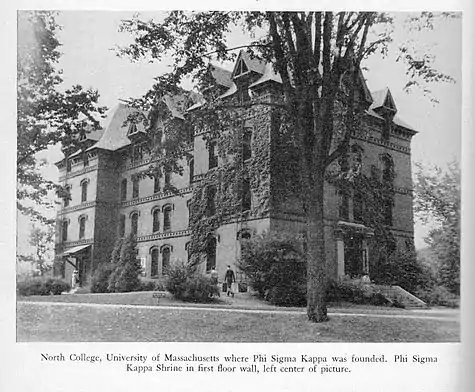 Old North Hall, site of ΦΣΚ's founding in 1873, at the University of Massachusetts Amherst. "The Shrine," a memorial to the Founders, is visible at the left of the front door.  Campbell was present for its dedication.