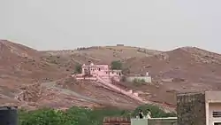 Hills around the old city and the Ghatila Balaji temple